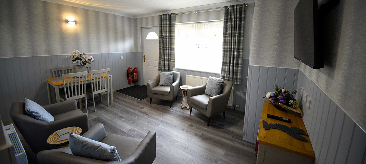 Self Catering accommodation in Portree spacious living room with comfortable seating
