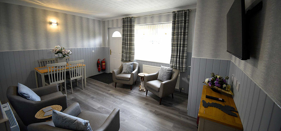 Self Catering accommodation in Portree spacious living room with comfortable seating