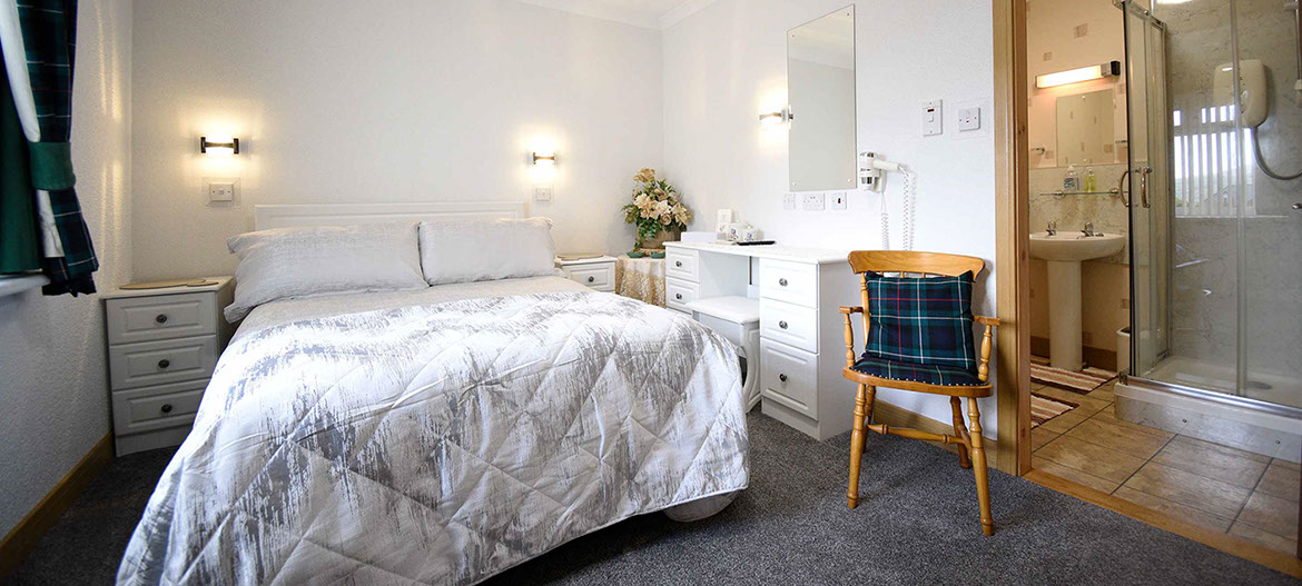Quiraing House in Portree contains a self catering suite with double and twin beds